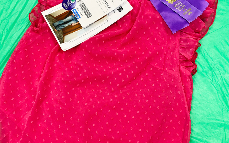 Static entries including Tenley Olinger’s best of show clothing and textile entry filled the 4-H Building during Achievement Days.