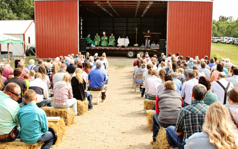 PHOTO COURTESY ALICIA ROESLER. Over 250 people from across the region and various faith backgrounds gathered for mass, a free meal and a speaker on the topic of “Faith and Farming” earlier this month. The event was held at Kolousek Farms  located southwest of Wessington Springs.