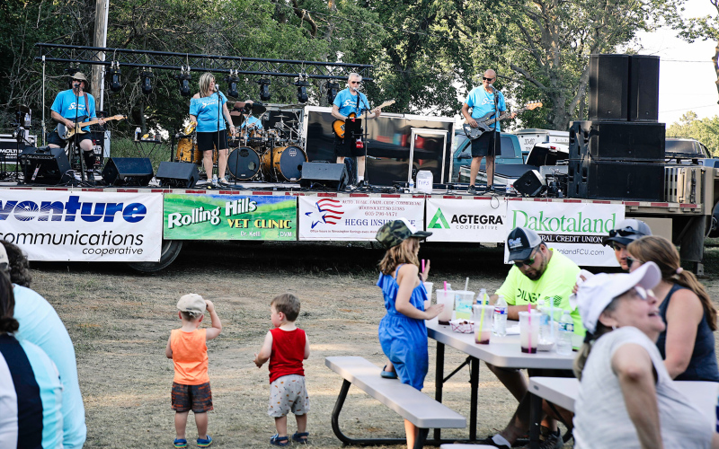 Laken Jensen and Scout Younie dance to the beat of Surfin’ Safari band.