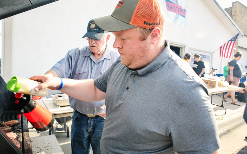 Verle Hoffman and Blake Willman busy at the grill.