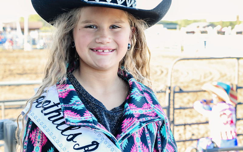 Foothills Rodeo Princess Koral Kroeplin paused for a photo before stepping up for candy scramble duties at the Bull Bash.