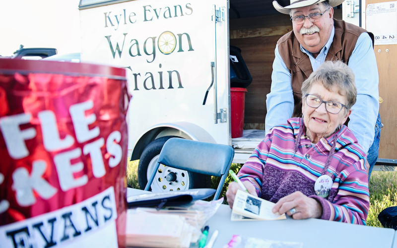Kyle Evans Memorial Wagon Train volunteers Mark Reindl and Diane Fastnacht were among those selling raffle tickets. Katie Jones of Alpena won the cooler raffle which was drawn Saturday night.