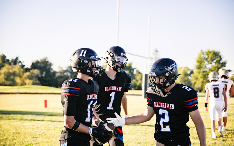 Wesley Molnar celebrates with Ryder Michalek and Colby Flowers. KRISTI HINE / TRUE DAKOTAN