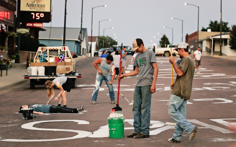 The senior class took a humorous yet mature approach to the whitewashing messages around town.