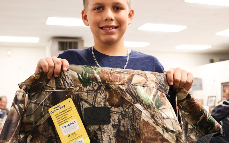 Jevon Kolousek and his family volunteered their help during the auctions, raffles and games.