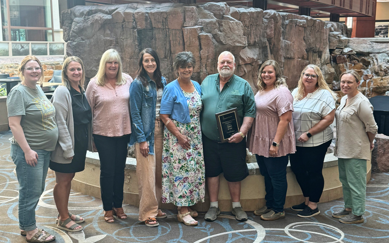Krohmer Agency team, shown left to right are: Kaci Anson, Lindsey Weich, Rhonda Smith, Keara Hohn, Jan Krohmer, Fred Krohmer, Betsy Schroeder, Jill Grohs, Casey Schmidt.