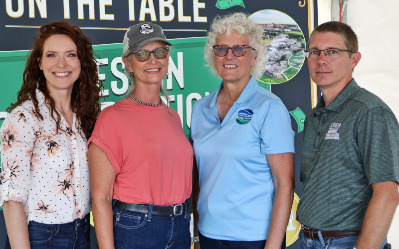 Project team Rebecca Blue, Colette Kessler, Angela Ehlers and Darrel DuVall on Aug. 22, 2024, at Dakotafest in Mitchell, S.D. They are using a $1.2 million grant to help women in agriculture grow their networks, expand their opportunities and build collaboration.