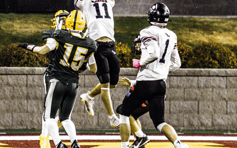 Ryder Michalek leaps up for an interception during the game. PHOTO COURTESY J. VON EYE IMAGES