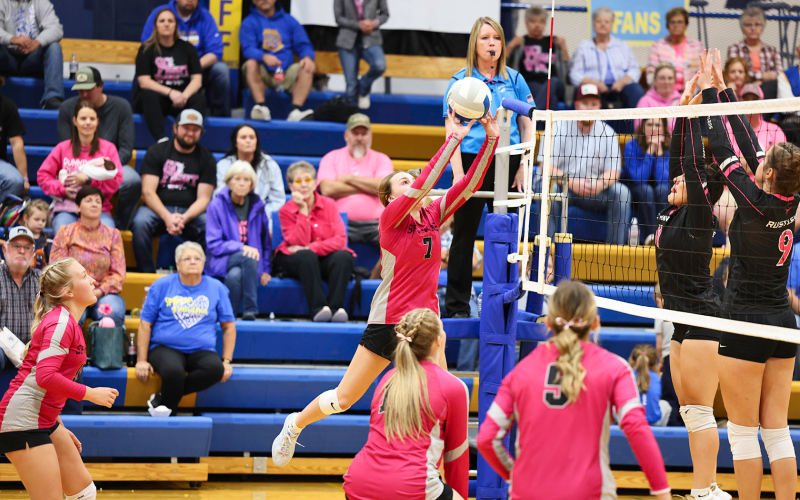 Ashlyn Weber gets under a set during volleyball action vs. Ethan.
