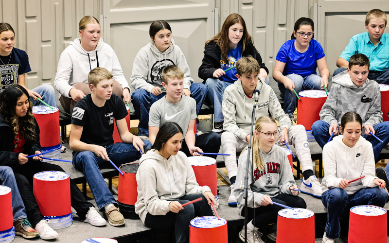 Middle schoolers entertained with a drum performance.