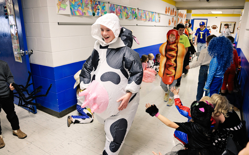 Henry Feistner generated some laughs from the kindergartners as he passed by in his cow costume.