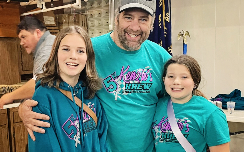 Jalene Reiner presented a check to Kopceky’s dad, Brad and sister Molly at a benefit held in Miller on November 2. COURTESY PHOTO