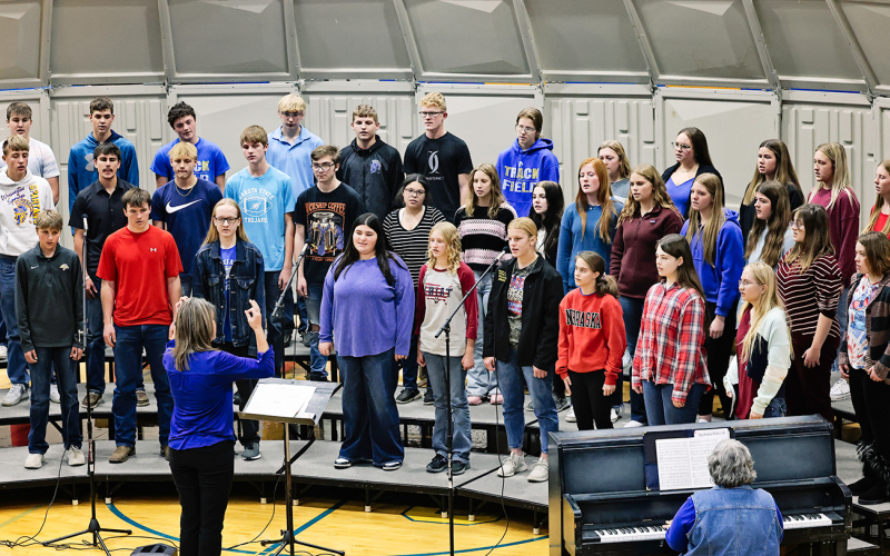 The high school choir delighted with “This is Our Land/You’re a Grand Old Flag.”