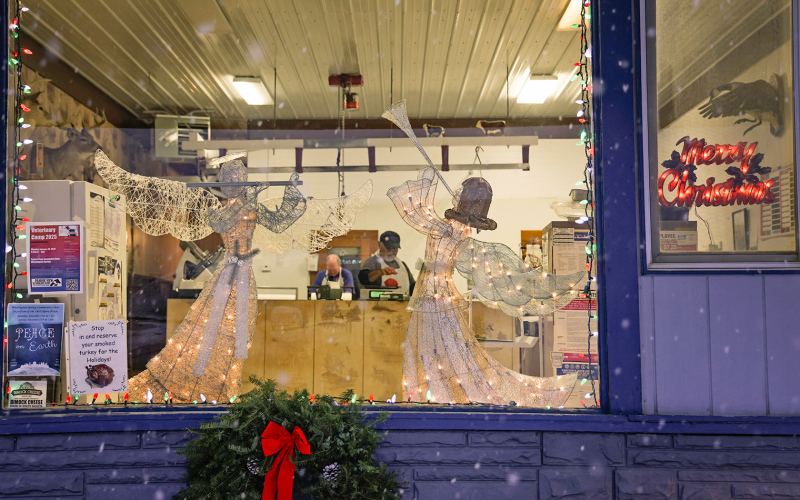 Dennis Mettler and crew were busy working at Mettler’s Locker on Main Street in Wessington Springs Tuesday morning behind a festive storefront decorated for the holidays.