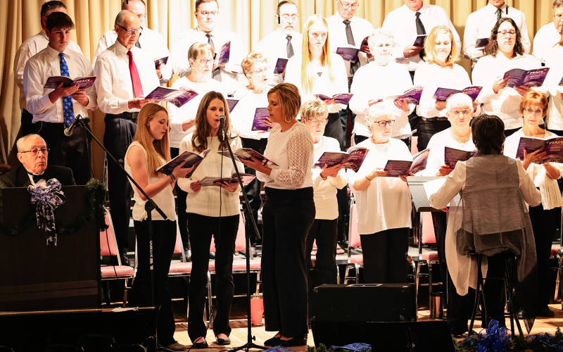 The trio of Tenley Olinger, Katee Olinger and Amber Kolousek sang a solo.