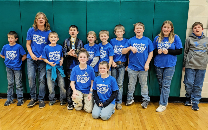 Junior and Senior Spartanbots are shown at the Eastern Regional Robotics Competition in Sioux Falls. Members of the team include: Kershaw Reiner, Will Jackson, Haven Heber, Houston Havlik, Crawleigh Reiner, Crew Wenzel,  Harley Heber, Otto Zastrow, Grace Jackson, Devin Mentele, Jalene Reiner, Payton Fraiser, Maverick Roduner and Dee Zastrow. PHOTO COURTESY KATIE JACKSON