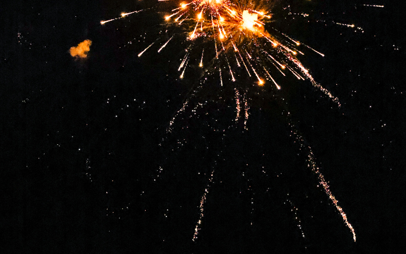 An orange rocket illuminated the New Year’s Eve sky over South Gulch in Wessington Springs last Wednesday night, December 31, 2024 as Jarrod and Jacki Bultsma, Jason and Cristin Weber and Dennis and Sandy Beckman carried on the tradition of gifting a glorious fireworks display to the community. KRISTI HINE / TRUE DAKOTAN