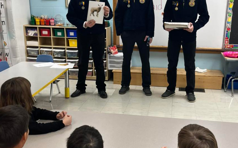 Max Klein, Luke Larson and Peyton Walz taight elementary school students during “Ag in the Classroom” last week. PHOTO COURTESY WS FFA CHAPTER