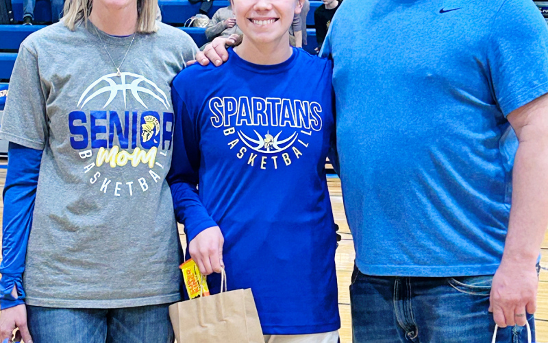 Shown with hern parents is Ashlyn Weber.