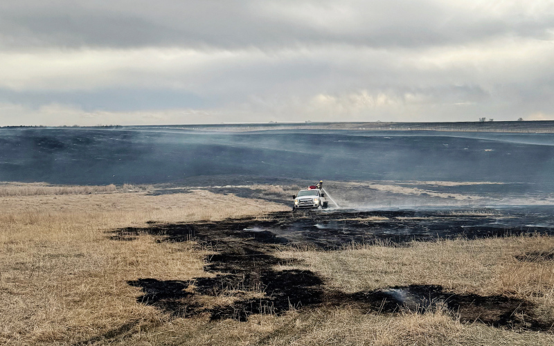Firemen spray hot spots on Sunday, March 23, 2025. PHOTO COURTESY WSVFD