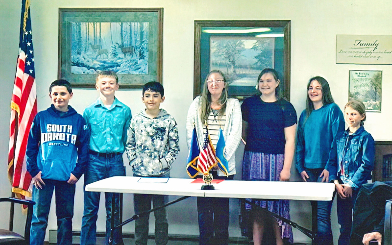 PHOTO COURTESY AMERICAN LEGION AUXILIARY POST 14 Shown left to right are the 2025 American Legion Auxiliary Post 14 essay and poem contest winners: Lorin Schaller, Casen Waters, Dante Colqui, Kylie Edwards, Josie Arhart, Gianna Grohs (local and district winner) and Crawleigh Reiner. Not pictured: Deandra Zastrow and Danny Tuj Mejia.