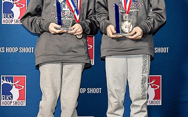 COURTESY PHOTO Caralina, left, and Chase Mebius of Hartford pose with trophies after winning their respective division of the regional Elks Hoop Shoot Contest last month. The duo are the grandchildren of Mike and Terri Mebius of Wessington Springs. The siblings will now participate in the National Finals on April 26.