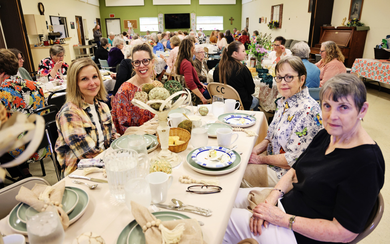 Utilizing beautiful table settings from her mother, her own collection, and Heather Larson at Sweet Grass, Angie Mentzer decided to go a little simpler this year with a farmhouse theme. The mixture of greens, tans, and browns created a wonderful neutral setting.