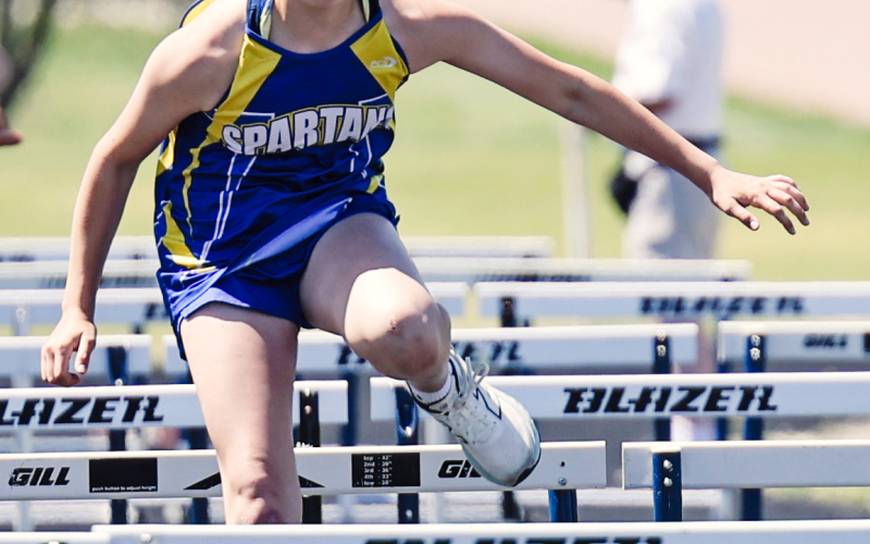 On Monday, May 5, 2025, Wessington Springs was the site for the Junior High 281 Conference meet, held at Spartan Stadium. Roslyn Klein is shown in the 100m hurdles.