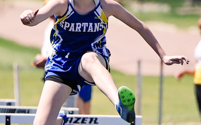 On Monday, May 5, 2025, Wessington Springs was the site for the Junior High 281 Conference meet, held at Spartan Stadium. Lily Roesler is shown in the 100m hurdles.
