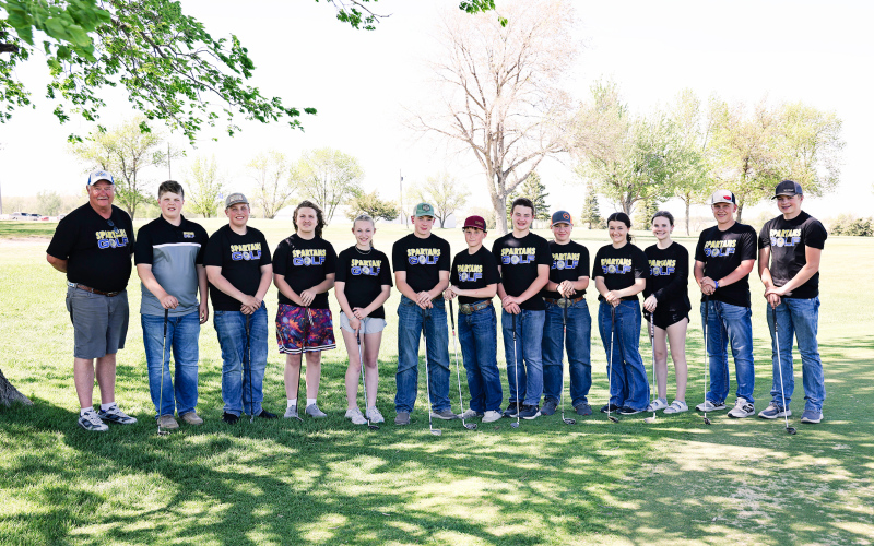 Junior High Spartan golfers, left to right: Assistant Coach Pat Law, Micah Orth, JR Hine, Will Jackson, Tenley Olinger, Wyatt Fagerhaug, Hastin Heezen, Emmitt Feistner, Connor Karsky, Kaycee Scheel, Jalene Reiner, Chaz Larson, Cole Wenzel.