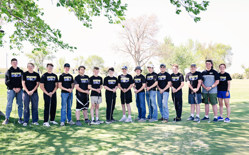 Junior Varsity Spartan golfers, left to right: Ethan Amick, Gavin Brandenburg, Brett Miller, Hunter Heezen, Will Bruckner, Tucker Thompson, Chase Dunsmore, Rylan Fagerhaug, Nolan Schaller, Teagan Scheel, Holden Jackson, Haiden Boschee, Ryder Roduner, Shayden Greeg and Head Coach Regina Teveldal.