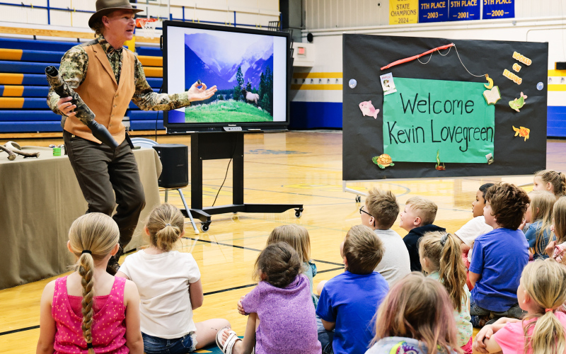 Award winning author Kevin Lovegreen visits WSES at AR assembly On Tuesday, May 6, 2025, award-winning author Kevin Lovegreen visited the Wessington Springs Elementary School as part of the Accelerated Reading Award assembly. He delivered an inspiring presentation, encouraging students to read, write and enjoy the outdoors. Author of the Lucky Luke’s Adventures series of children’s books, he shared stories about some of the real-world hunts that inspired the series of books.