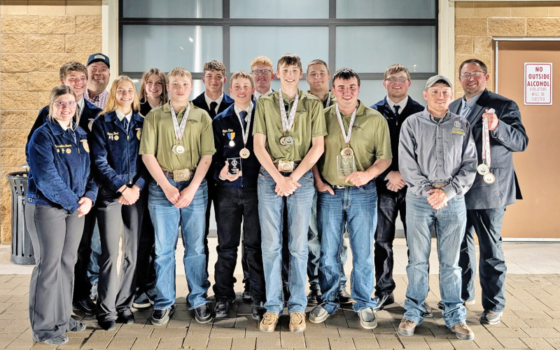 A large group from Wessington Springs is pictured in Oklahoma City at the National Land and Range Judging Contest. Back row, left to right: Kohen Mebius, Chaperone Wade Christensen, Addyson Orth, Peyton Walz, Luke Larson, Robert Hine, Holden Jackson, FFA Advisor Brady Duxbury. Front row: Mercedes Jones, Bailey Yost, Hayes Christensen, Logan Klein, Landen Christensen, Ridge Roduner, coach Tyler Swan.