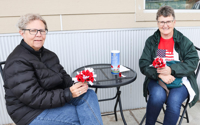 Julie Kaus and Joyce Krueger were among the American Legion Auxiliary members selling poppies ahead of Memorial Day.