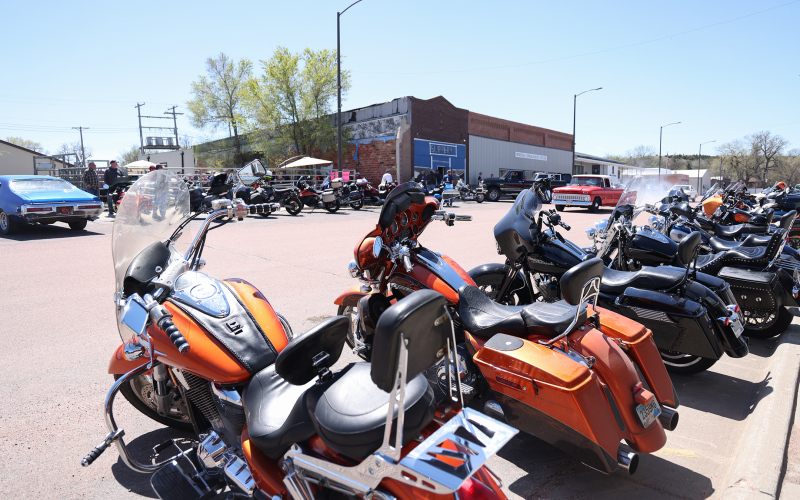 Hundreds of bikes and several vintage cars lined Main Street Saturday afternoon.