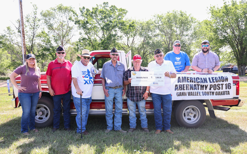 Shown left to right during Gann Valley’s 140th anniversary celebration held on June 21, 2025 are: Tara Miller, Manager of Communications for Central Electric Cooperative; Abernathy Post 16 member Clayton Anderson, Mark Reindl, representaive for Jerauld County on the Central Electric board of directors; Abernathy Post 16 members Lydell Krog, Ken Wulff, Glenn Mayer, CJ Wulff and Kristian Wulff. KRISTI HINE / TRUE DAKOTAN
