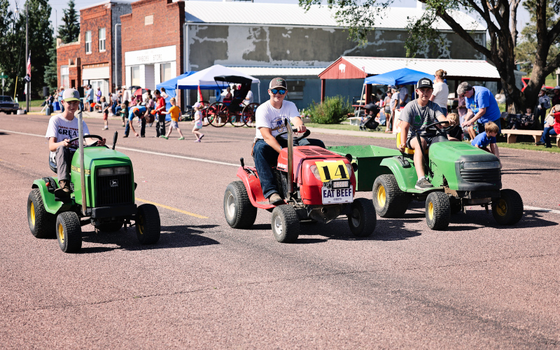 The lawnmower brigade of Billy Roduner, Mauer Jones and Weston Roduner rolled through the parade in Gann Valley to celebrate the town’s 140th birthday.
