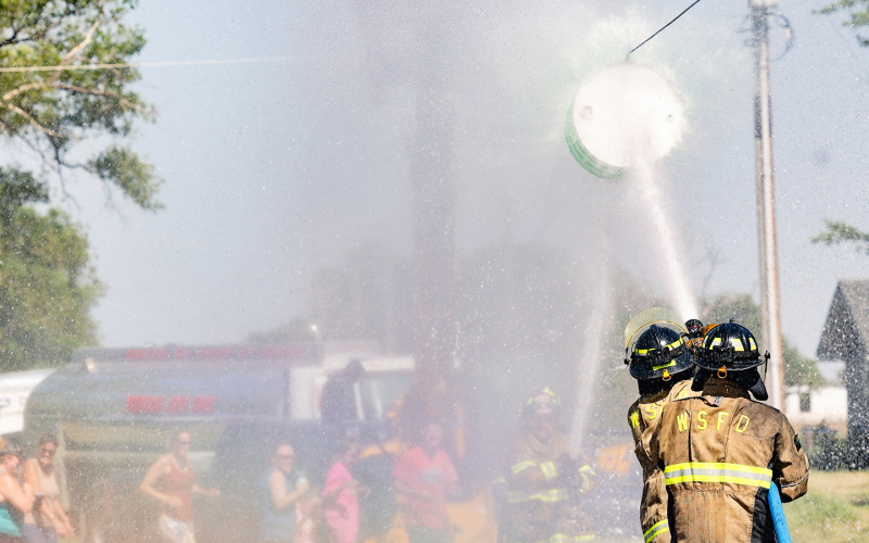 At Leap to Lane, attendees cooled off with the over-spray from the fireman’s challenge between Wessington Springs and Woonsocket Volunteer Fire Departments on Saturday, June 21, 2025.