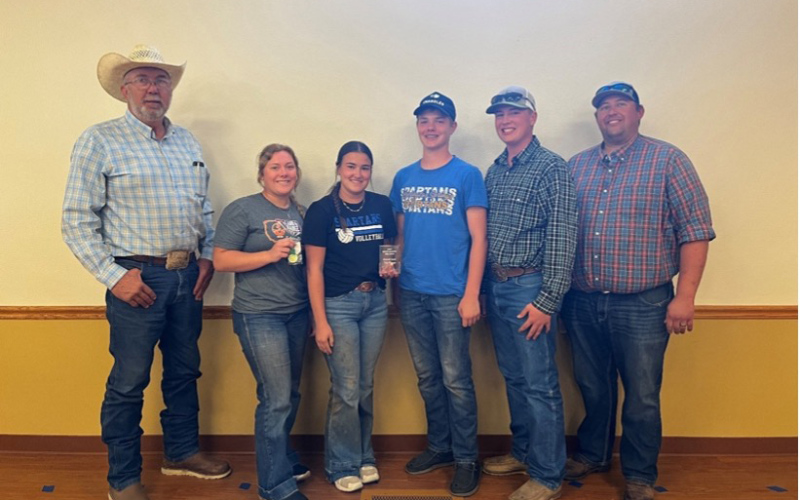 The top Soil Contest 4-H team was Jerauld County 4-H whose members were (left to right) Ella Fagerhaug, Remie Roduner, Kohen Mebius, and Max Klein. Also pictured are Dave Ollila (far left) of the South Dakota Soil Health Coalition and coach, Brady Duxbury (far right). This team will represent South Dakota at the National Land and Range Judging Contest in 2026 in Yukon, Oklahoma. PHOTO COURTESY SDSU EXTENSION