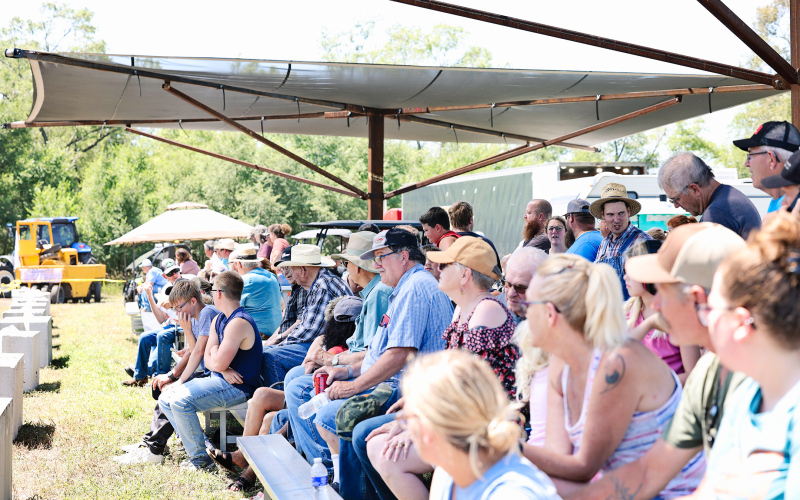 Despite the heat, event attendees enjoyed the show by finding some shade and a cold beverage.