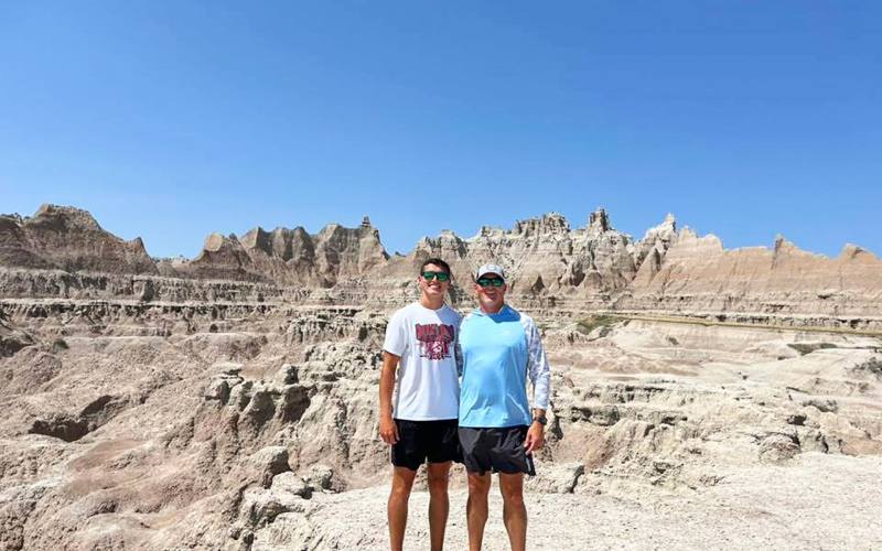 Brock and Mike Krueger in the Badlands en route to their July 2025 family vacation in the Black Hills. (PHOTO COURTESY BECKY KRUEGER )