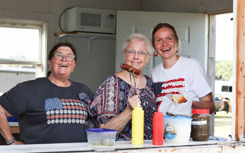 Church concession volunteers Fran Peterson, April Grubb and Ruthe Lindvall served a side of laughter with every order.
