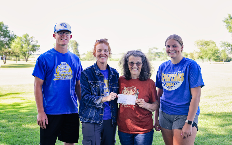 Shown during a check presentation held Monday, June 23, 2025 are, left to right: Spartans Golf varsity athlete Luke Larson, Head Coach Regina Teveldal, Pair of Jacks event organizer Jean Ferguson (Joyce Krueger not pictured), Spartans Golf varsity athlete Kaitlyn Braun. KRISTI HINE / TRUE DAKOTAN
