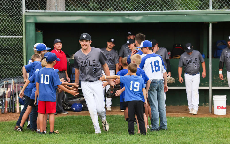 High fives all around for Owls player Camden Jost.