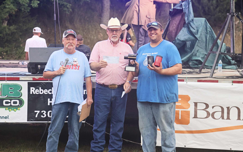 Brady Duxbury took home the second-place prize at this year’s Rockin’ Ribfest. His technique this year included harvesting oak wood from the South Gulch to localize the flavor of the smoked ribs. (PHOTO BY KATIE DENEKE)
