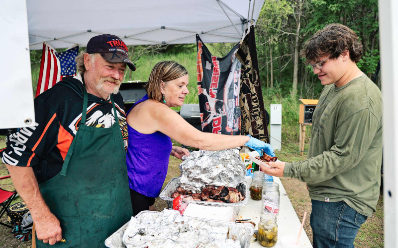 Return contestants Mike and Barbie Brunsen serve up their homemade recipes to hungry attendees.