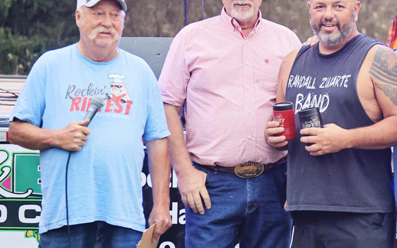 Mike Roti’s Mustang Team claimed the top prize at this year’s Rockin’ Ribfest. He is shown (right) with Wessington Springs Area Development (WSACD) Chairman Darrell Deneke and WSACD board member Phil Wipf. (PHOTO BY KATIE DENEKE)