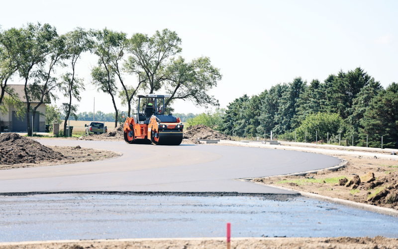 Crews were busy installing asphalt on the new track last week.