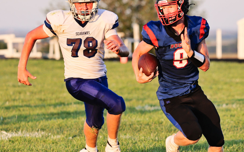 Quarterback Luke Larson (9) completed 12 of 22 passes for 230 yards and two touchdowns.