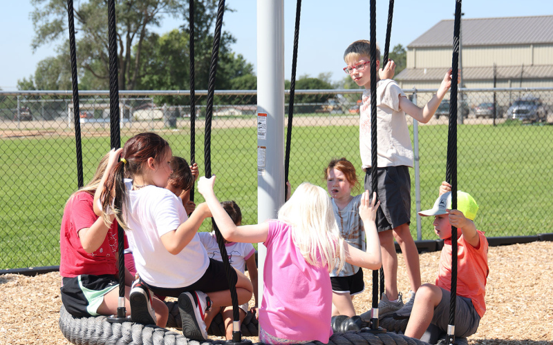 New, interactive play stations are features on the new playground.